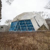 The Dome in Woods Hole, the oldest surviving geodesic dome in the world built by Buckminster Fuller, is in a state of total disrepair. (Jesse Costa/WBUR)