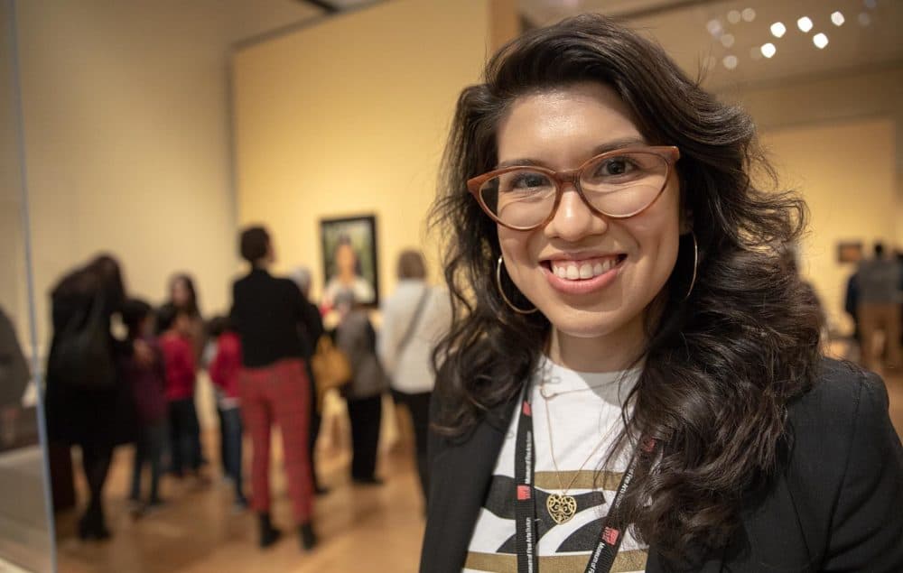 Layla Bermeo, assistant curator of American paintings, at the "Frida Kahlo and Arte Popular" exhibition at the MFA. (Robin Lubbock/WBUR)