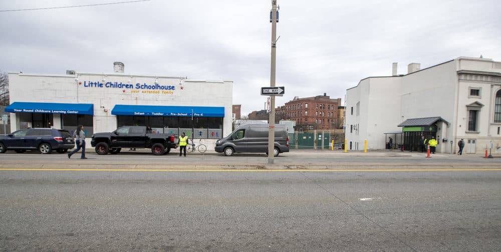 The Little Children Schoolhouse daycare is situated right next to the NETA dispensary in Brookline Village. (Jesse Costa/WBUR)
