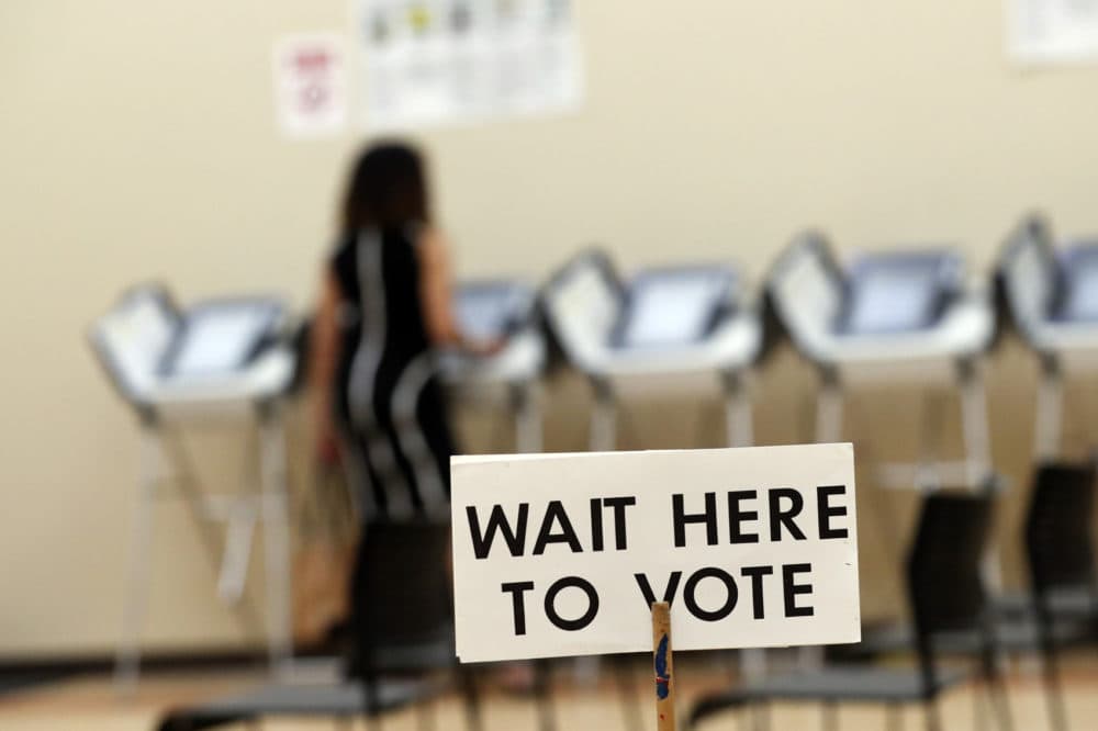 In this Wednesday, May 9, 2018, photo, Pamela Hampton votes in Sandy Springs, Ga. (John Bazemore/AP)