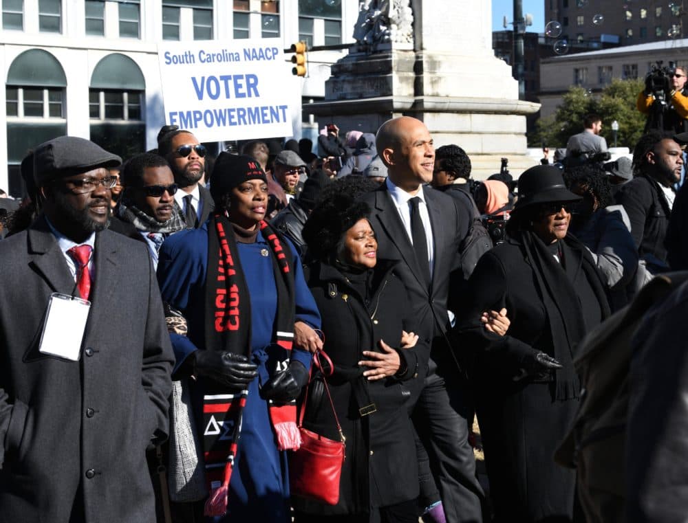 Sen. Cory Booker, pictured on Jan. 14, 2019 in South Carolina, is one of several Democratic presidential candidates who have embraced the idea of reparations. (Meg Kinnard/AP)