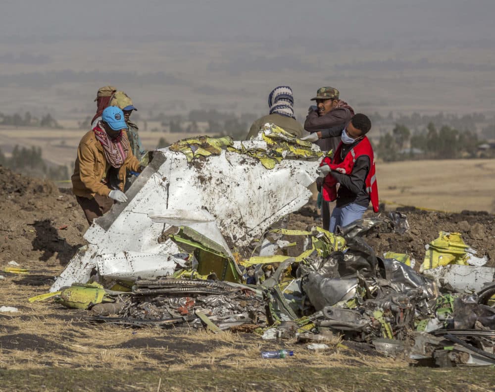 Rescuers work at the scene of an Ethiopian Airlines flight crash near Bishoftu, or Debre Zeit, south of Addis Ababa, Ethiopia, Monday, March 11, 2019. (Mulugeta Ayene/AP)