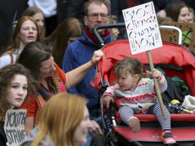 Students take part in a global school strike for climate change in Canterbury, south east England, Friday March 15, 2019. (Gareth Fuller/AP)