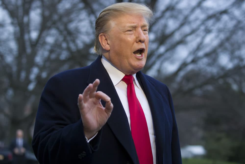 President Trump speaks with the media after stepping off Marine One on the South Lawn of the White House on Sunday, March 24. (Alex Brandon/AP)