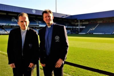 Reverends Bob Mayo and Cameron Collington volunteered at Queens Park Rangers for 12 years. (Katie Thornton for WBUR)