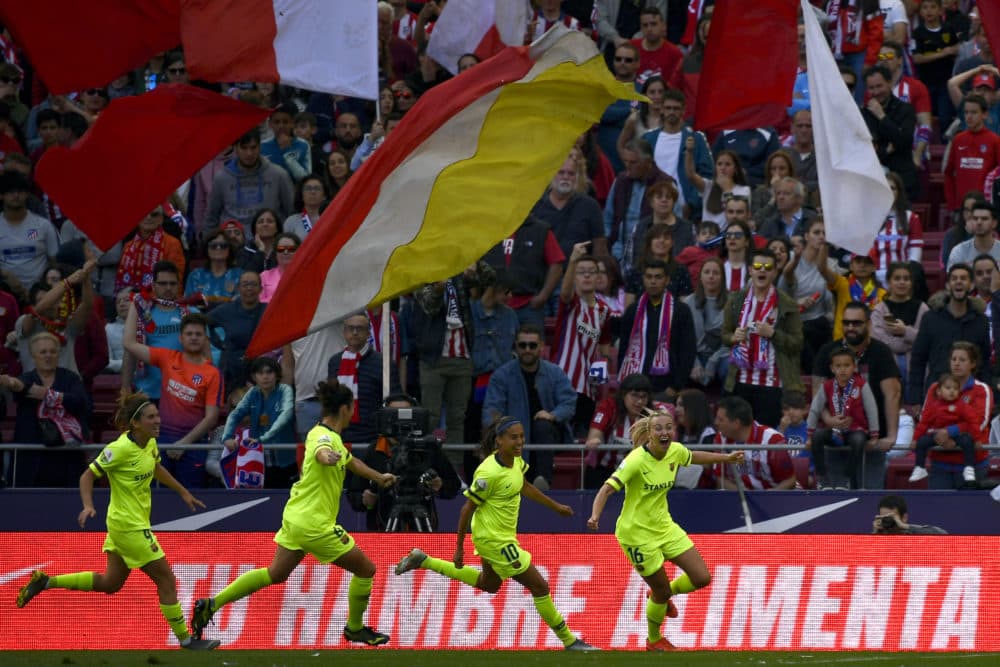 F.C. Barcelona celebrate their goal against Atlético Madrid. (Gabriel Bouys/AFP/Getty Images)