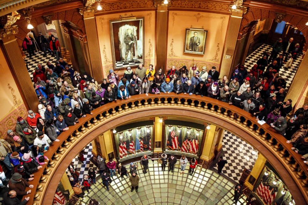 Protestors filled the Michigan State Capitol before the state electoral college met to cast their votes on December 19, 2016 in Lansing, Michigan. (Sarah Rice/Getty Images)