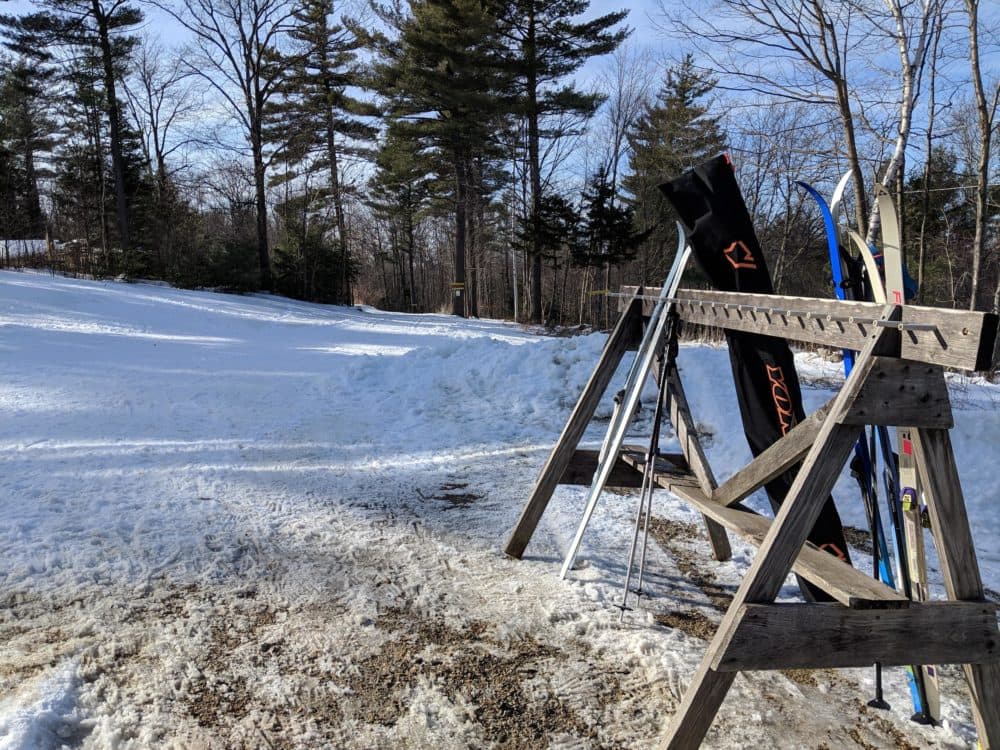 Frequent rains and thaws this winter have made it hard for ski areas like Windblown Cross Country Skiing and Snowshoeing in New Hampshire to maintain the base layer of snow necessary to groom ski trails. (Annie Ropeik/NHPR)