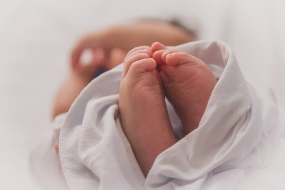 Baby's feet. (Luma Pimentel/Unsplash)