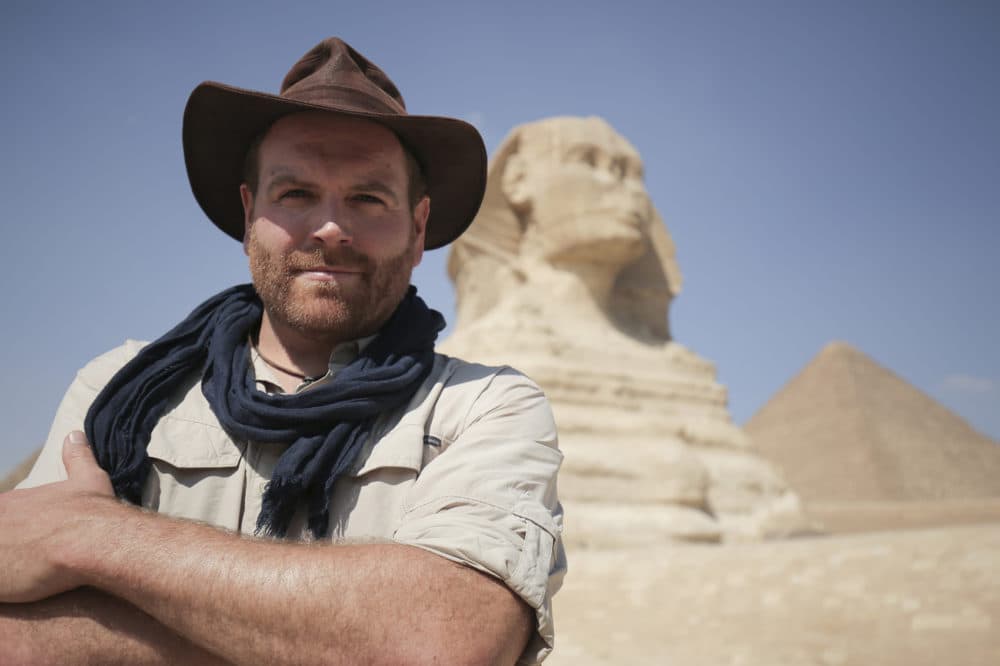 Josh Gates, host of Discovery's "Expedition Unknown," in front of the Sphinx in Giza, Egypt. (Courtesy of Discovery)