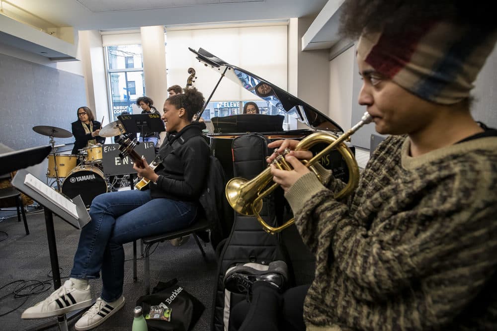 Terri Lyne Carrington joins students on the drums as they play the Thelonius Monk song "Bemsha Swing" at Berklee's Institute of Jazz and Gender Justice class. (Jesse Costa/WBUR)