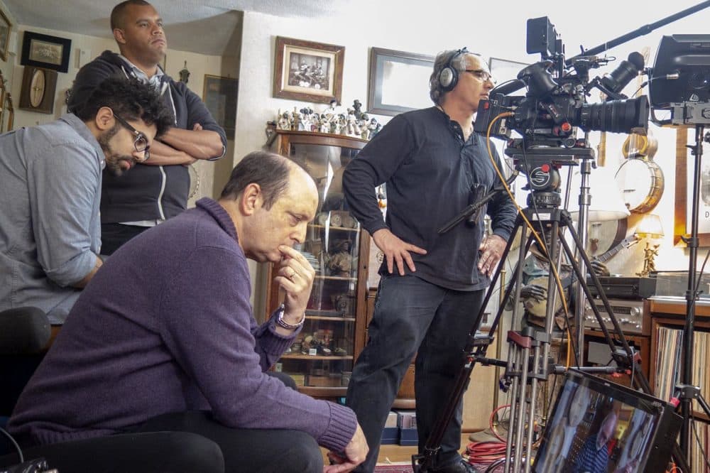 The Banjo Project crew films at Jim Bollman’s house. (Andrea Shea/WBUR)