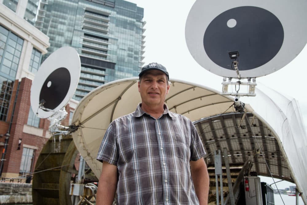 Trash has flooded the Baltimore Inner Harbor for years. Motivated to clean up Baltimore's waters, John Kellett invented Mr. Trash Wheel to help prevent garbage from reaching the harbor. (Rosem Morton for Here & Now)