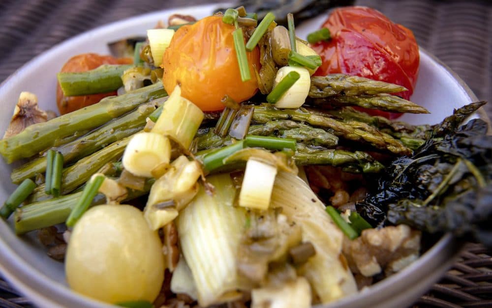 Chef Kathy Gunst's roasted spring vegetables on farro with a lemon-chive vinaigrette. (Robin Lubbock/WBUR)