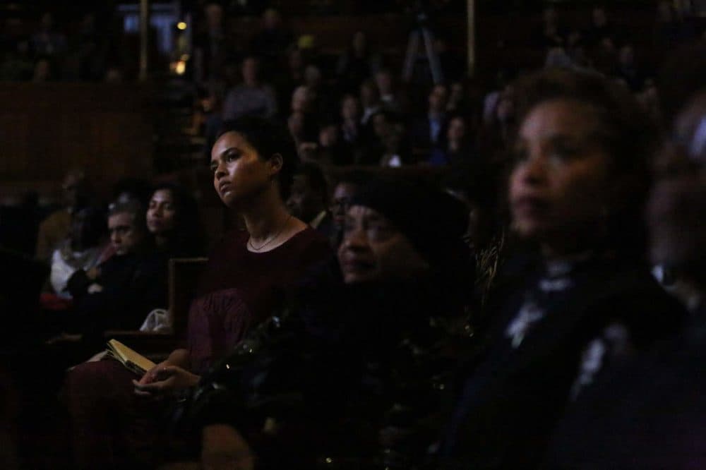 Audience members listen during the Friday evening program of Vision and Justice. (Hadley Green for WBUR)