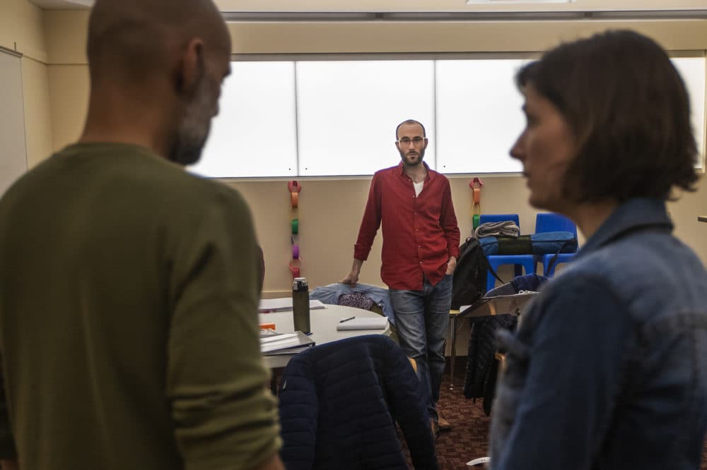 Guy Ben-Aharon works with actors Nael Nacer and Philana Mia on "The Return." (Jesse Costa/WBUR)