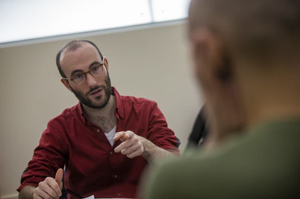 Guy Ben-Aharon, artistic director of the Israeli Stage, talks through "The Return" with actor Nael Nacer during a rehearsal. (Jesse Costa/WBUR)