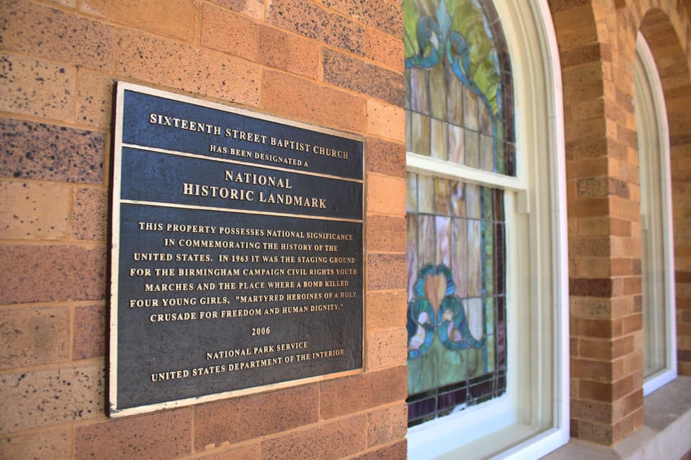 A plaque near the entrance of 16th Street Baptist Church in Birmingham, Ala. (Ciku Theuri/Here & Now)