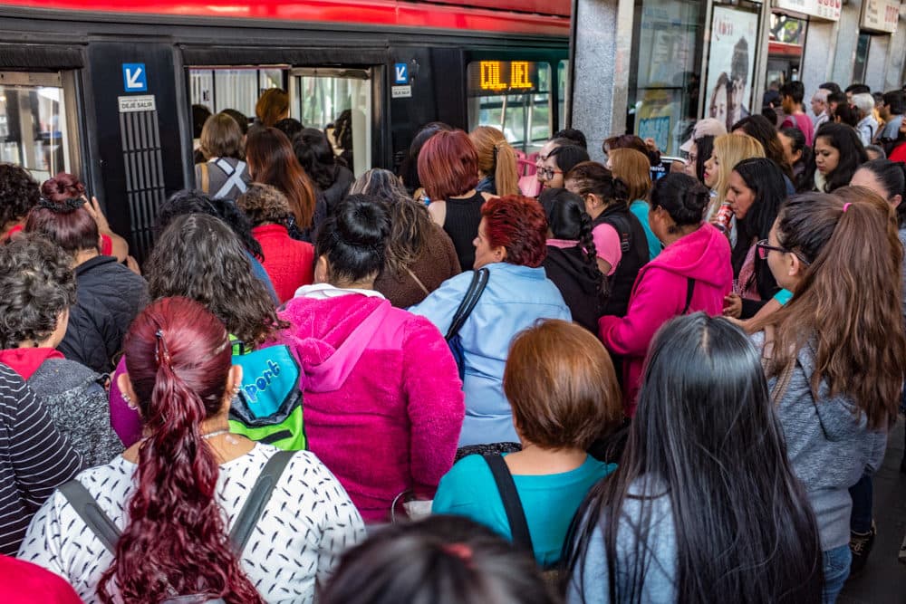 Buses are packed during rush hour, and sometimes there are long lines at stations. (Keith Dannemiller for WBUR)