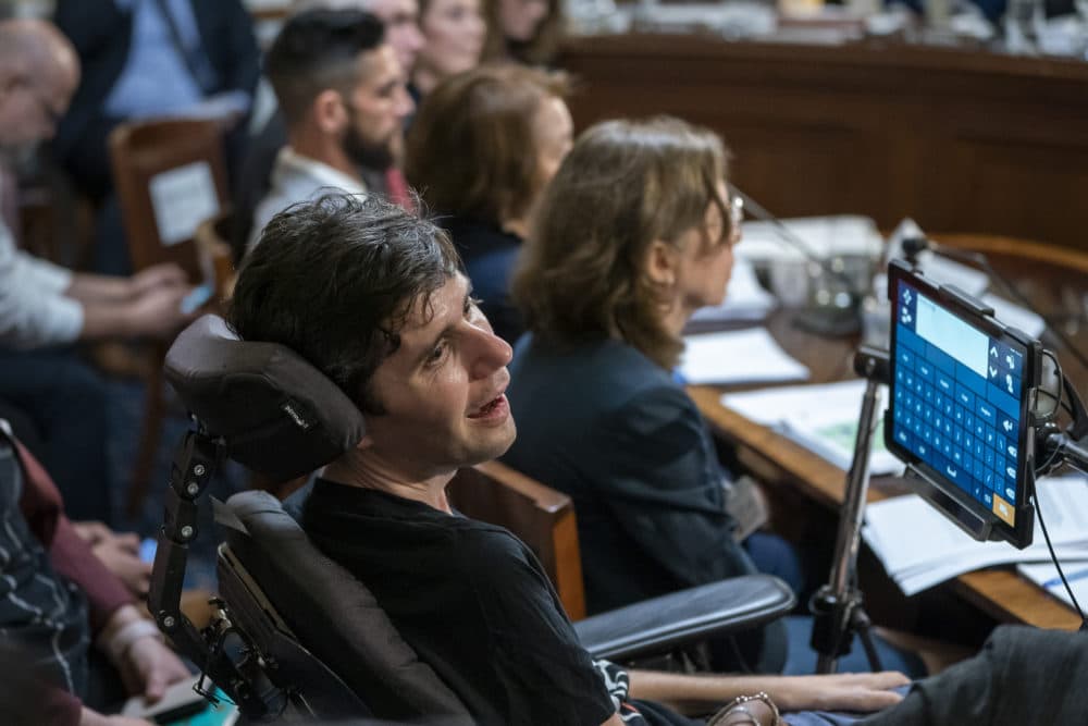 Ady Barkan, a health care activist who suffers from ALS, testifies before the House Rules Committee on Tuesday, April 30, 2019. (J. Scott Applewhite/AP)