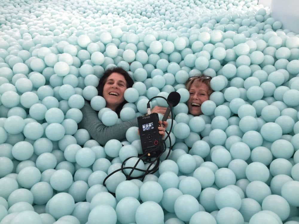 Host Robin Young and producer Karyn Miller-Medzon inside the massive ball pit at the Color Factory.