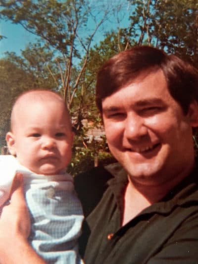 Wright Thompson Sr. holding his son. (Courtesy Wright Thompson Jr.)