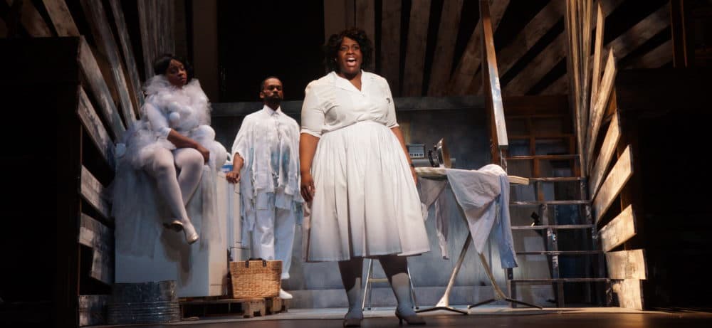 Yewande Odetoyinbo (right) as Caroline in Moonbox Productions' "Caroline, or Change" at the Calderwood Pavilion. Pier Lamia Porter and Davron S. Monroe give life to the washer and dryer. (Courtesy Sharman Altshuler)