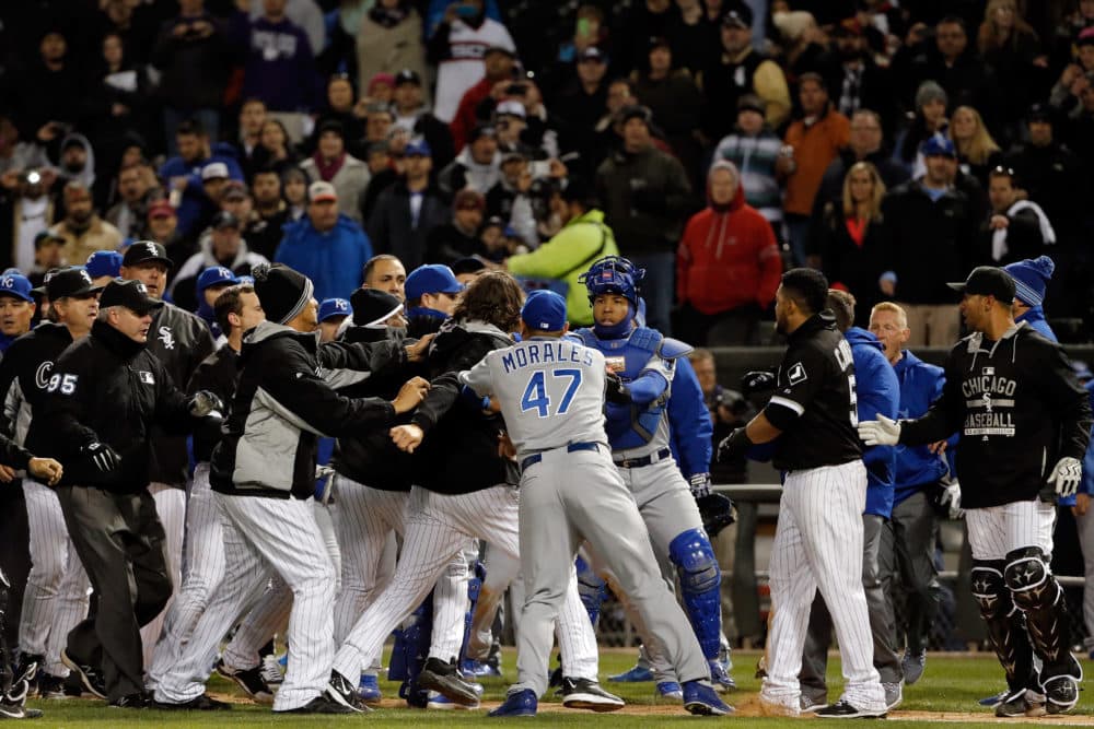 Franklin Morales of the Kansas City Royals tries to push back Jeff Samardzija of the Chicago White Sox during a fight this week that was sparked by a bat flip. (Jon Durr/Getty Images)