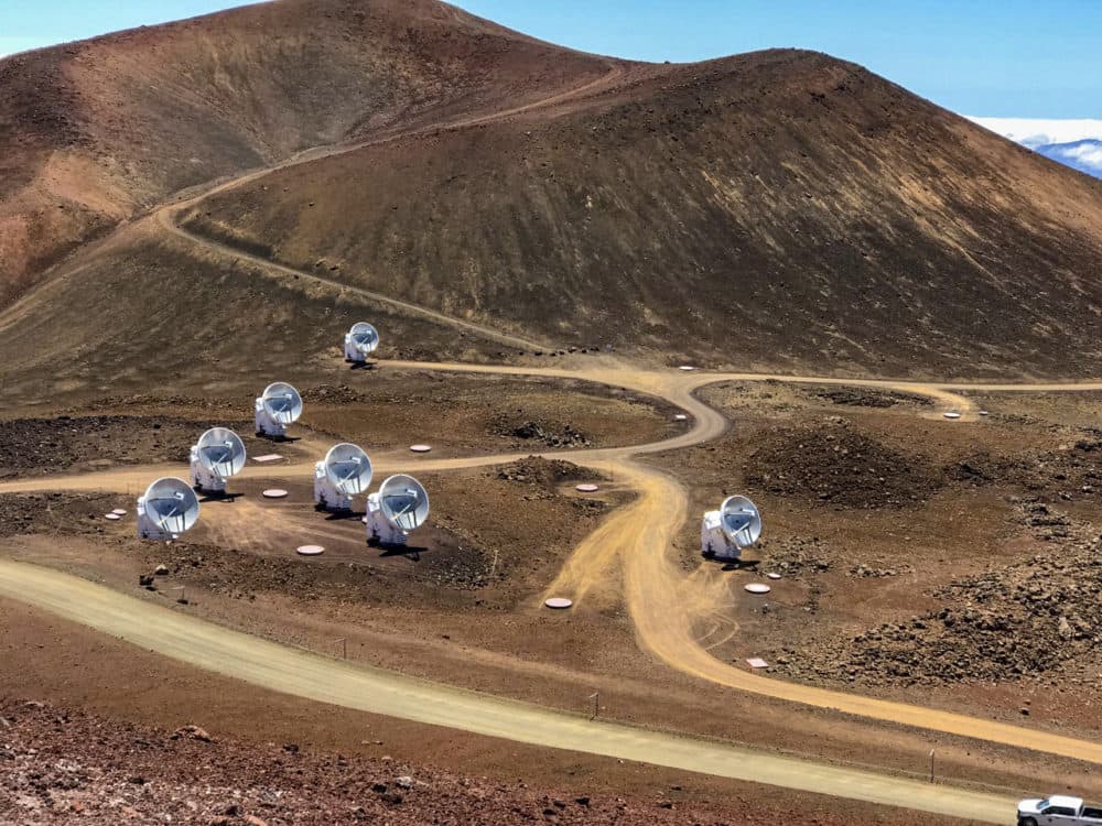 This April 4, 2019, photo, provided by Maunakea Observatories shows the Submillimeter Array, part of the Event Horizon Telescope network on the summit of Mauna Kea, Hawaii. Scientists revealed the first image ever made of a black hole using these telescopes. (Maunakea Observatories via AP)