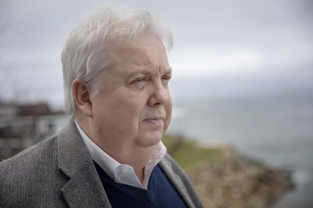 Plymouth's Sean Mullin, chair of the state's Nuclear Decommissioning Citizens Advisory Panel, looks out across Cape Cod Bay. (Robin Lubbock/WBUR)