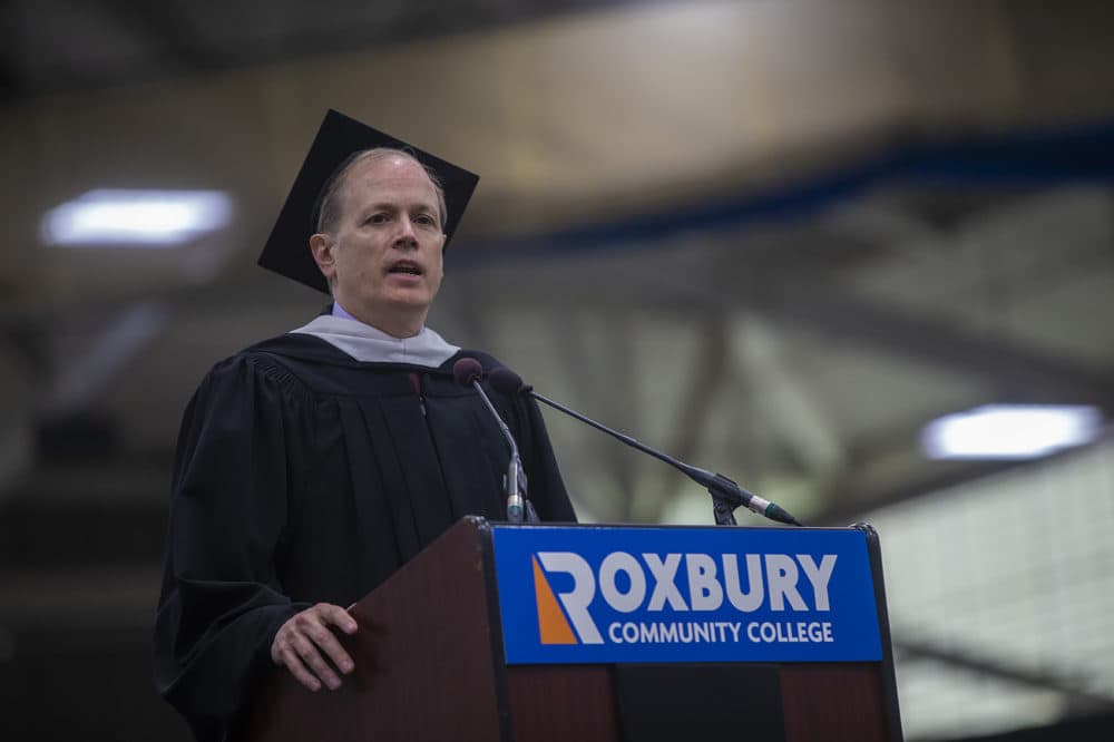 Secretary of Education James Peyser speaks to Roxbury Community College graduates during their commencement. (Jesse Costa/WBUR)