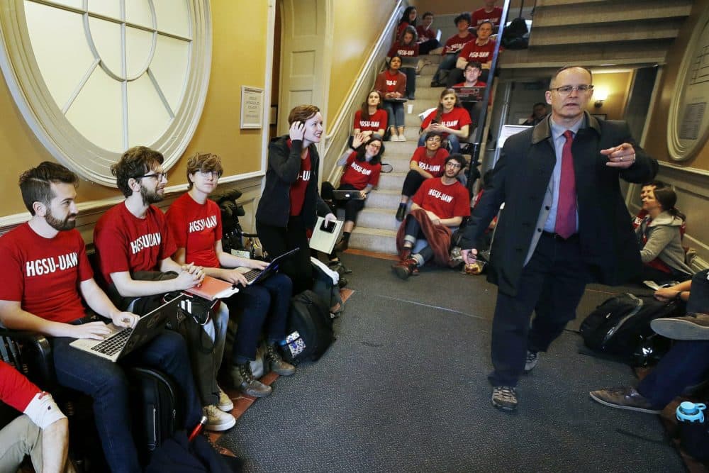 Protesters occupy University Hall at Harvard University in Cambridge, Mass., Wednesday, May 1, 2019. Students planned campus-wide protests on Wednesday over what organizers say are increasing incidents of harassment and discrimination. (Michael Dwyer/AP)