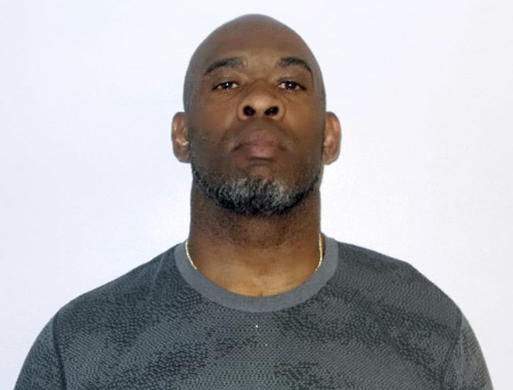 Greg Spires, a former NFL football player accused of violating a protective order in Concord, N.H. (Concord Police Department via AP)