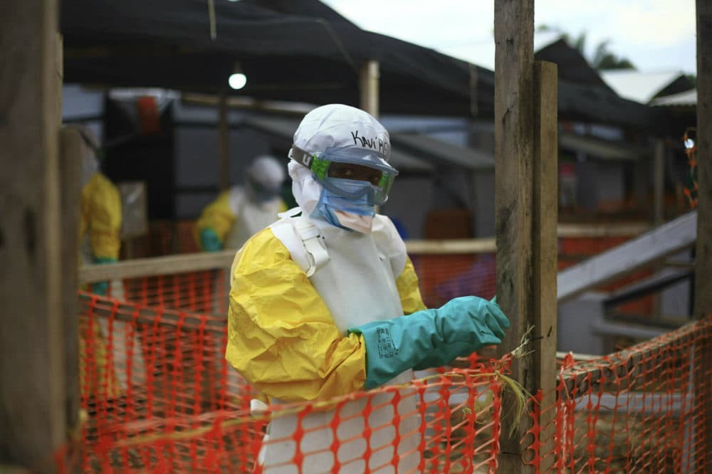 In this Tuesday April, 16, 2019 file photo, an Ebola health worker is seen at a treatment center in Beni, Eastern Congo. (Al-hadji Kudra Maliro, file/AP)