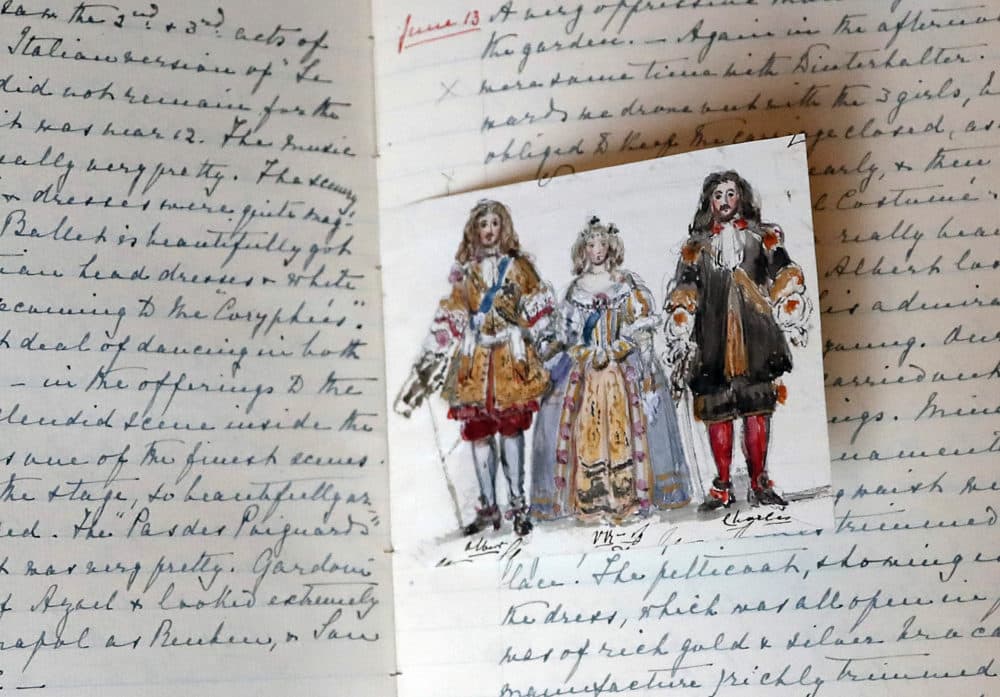 Queen Victoria's self-portrait sketch of herself, center, and Prince Albert, left, at the Stuart Ball is part of an exhibition to mark the 200th anniversary of the birth of Queen Victoria (1819–1901) this year at Buckingham Palace in London. (Frank Augstein/AP)