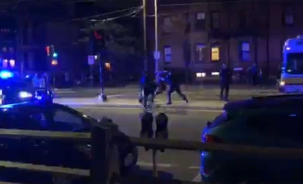 A screenshot from an onlooker's video of the 2018 arrest (Courtesy of Cambridge Police)