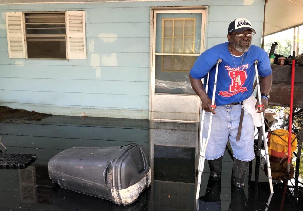 Anderson Jones stands by his flooded home outside of Fitler, Miss. "I tried to stay and hold on as long as I could," he says. (Peter O'Dowd/Here & Now)