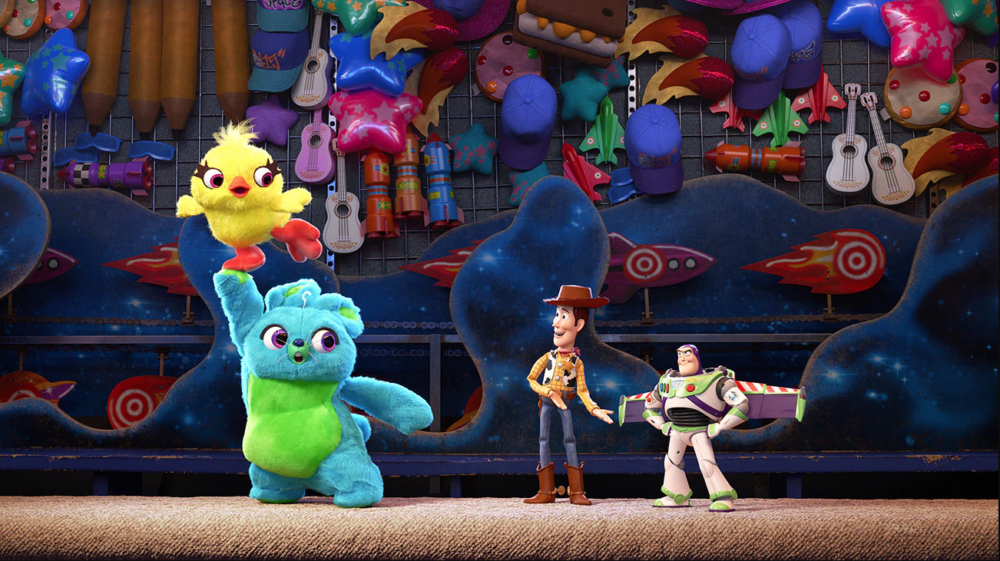 Ducky and Bunny (voiced by Keegan-Michael Key and Jordan Peele) with Woody and Buzz Lightyear (voiced by Tom Hanks and Tim Allen) in "Toy Story 4." (Courtesy Disney/Pixar)
