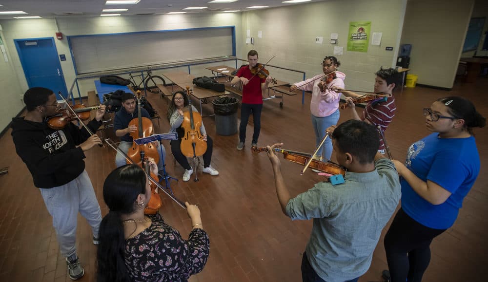 Members of the Roxbury Youth Orchestra rehearsing at John D. Bryant School in Boston. (Jesse Costa/WBUR)