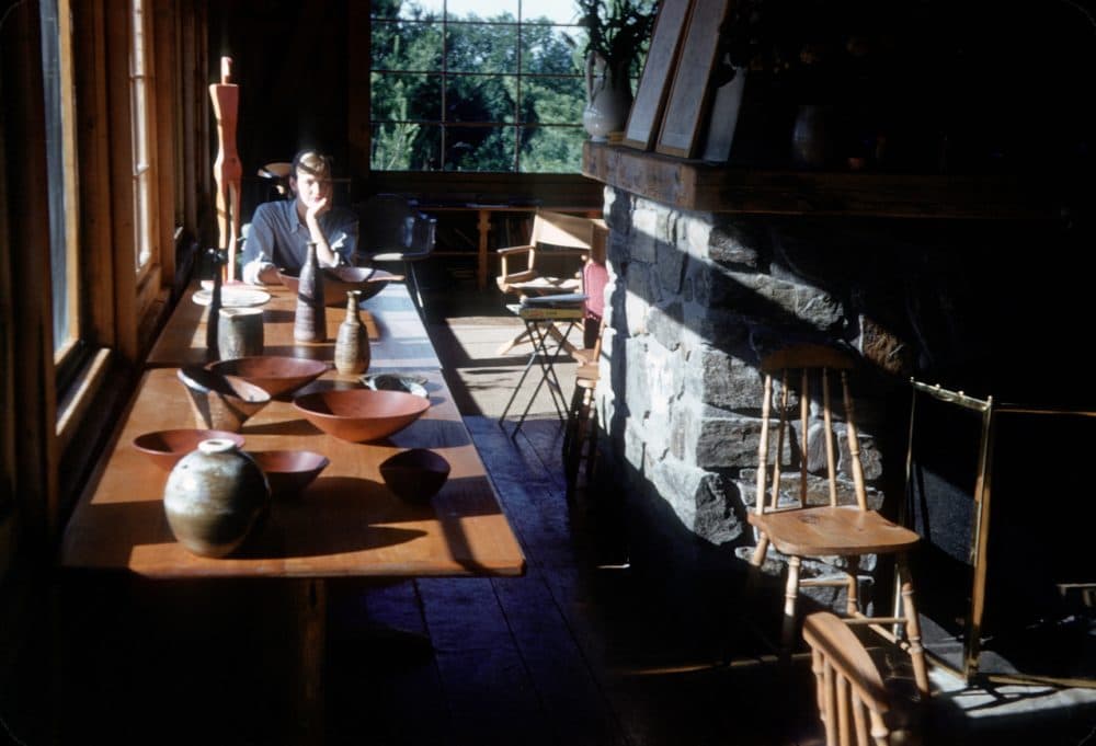 Marcianne Mapel in the original main building of the Liberty campus with assorted wares, 1954. (Courtesy Haystack Mountain School of Crafts)