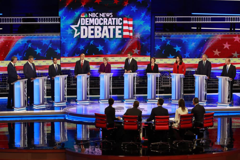 Democratic Presidential Candidates Take The Stage In First Debate On