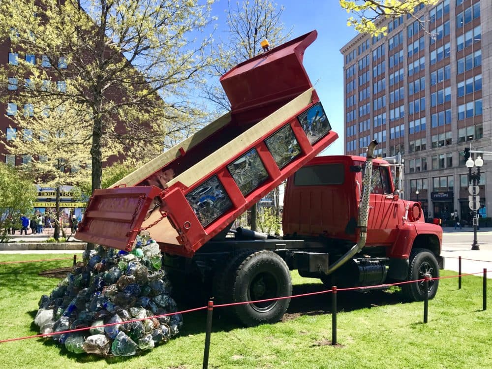 Karl Unnasch works with stained glass to portray life in blue-collar America. His work for "The Auto Show" recalls the work put in to the Big Dig. (Courtesy Rose Kennedy Greenway Conservancy)