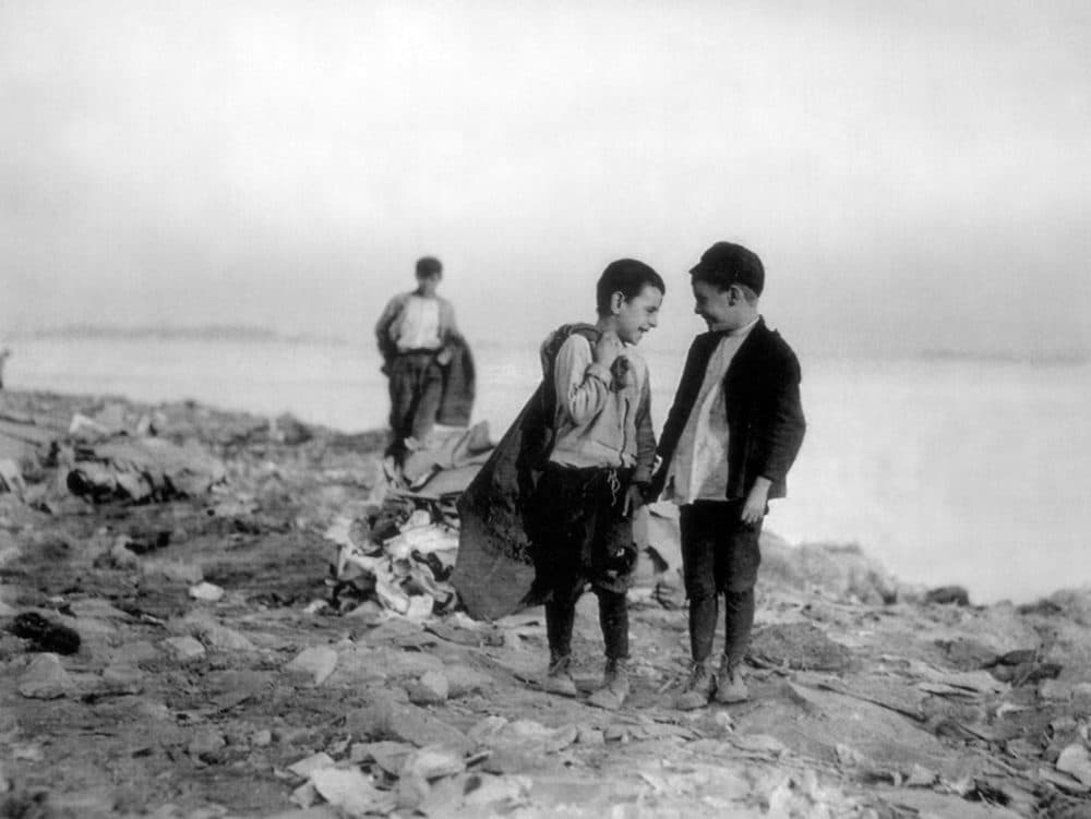 'Boys Picking over Garbage in 'the Dumps,'" Lewis Wickes Hine, Boston 1909. (Courtesy National Archives)
