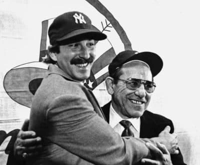Dale Berra poses with his father at Yankee Stadium after Dale was traded to the Yankees from the Pittsburgh Pirates. (Paul Burnett/AP)