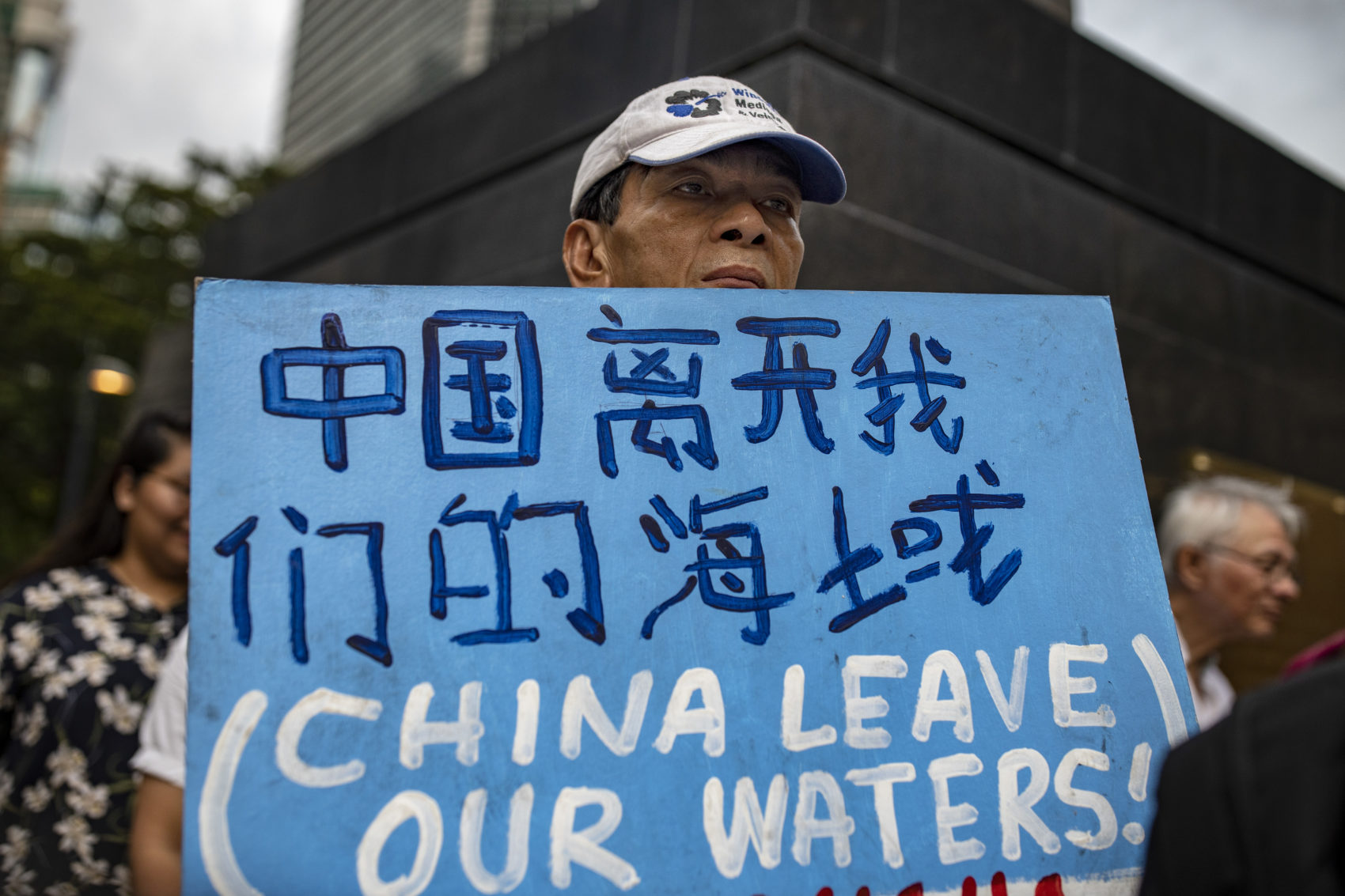 Filipinos take part in a protest condemning China's incursion at the West Philippine Sea in Makati, metro Manila, Philippines. (Ezra Acayan/Getty Images)