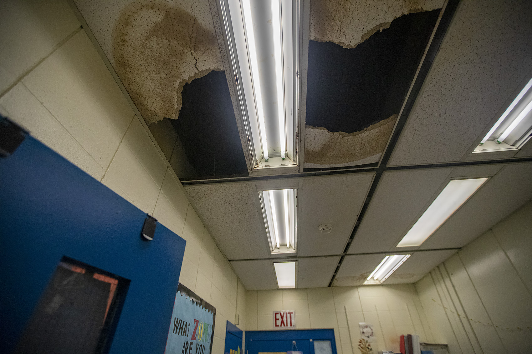 Falling Ceiling Tiles And Rusty Windows Inside A Boston