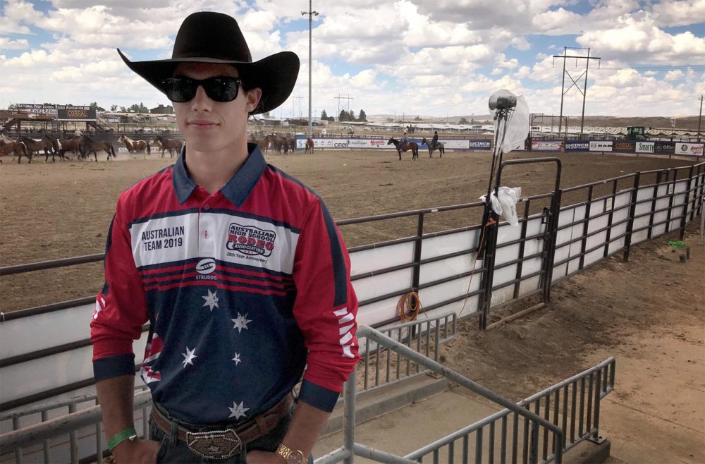 Zane Hall, a 17-year-old bull rider and steer wrestler from Queensland, Australia, took three airplanes with his dad to compete in Wyoming. (Peter O'Dowd/Here & Now)