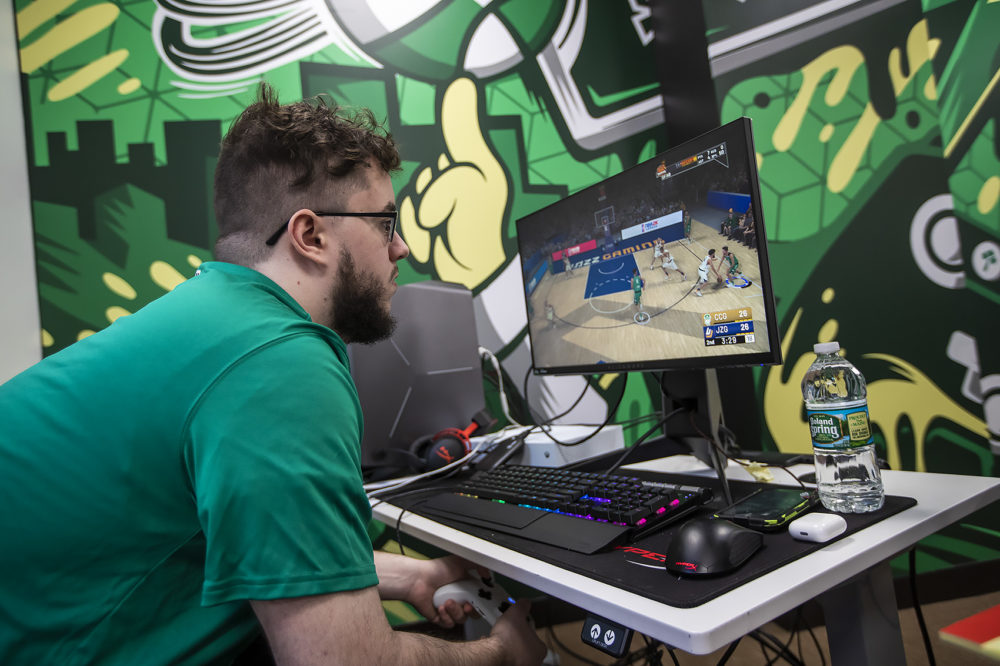 Celtics Crossover Gaming point guard oFab leans in during a preseason game against Jazz Gaming in March. (Jesse Costa/WBUR)