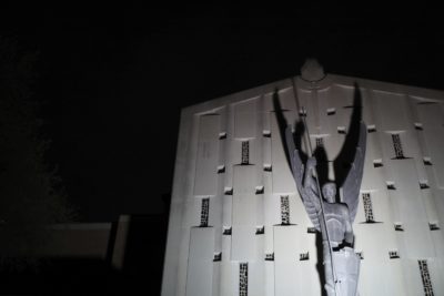 The facade of St. Michael Archangel Catholic Church in Houston, Texas is illuminated at night on April 11, 2019. (Wong Maye-E/AP)