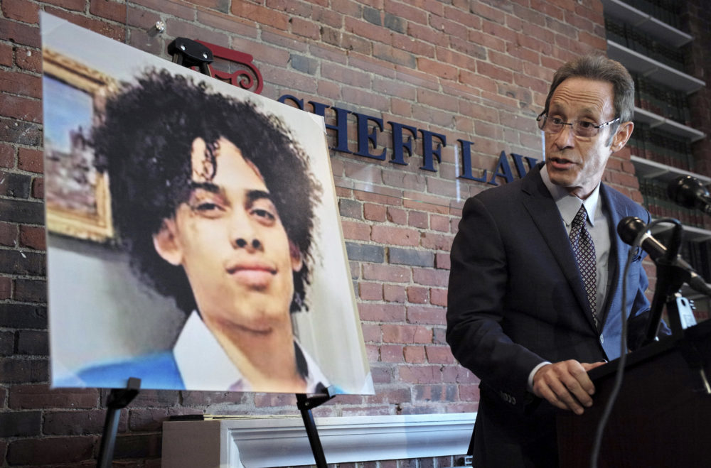 In this 2018 file photo, Doug Sheff, right, an attorney for the family of Leonel Rondon, pictured at left, faces reporters during a news conference, in Boston. Rondon, 18, died Sept. 13, 2018, in Lawrence after the chimney of an exploding house crashed on to his car. (Steven Senne/AP)
